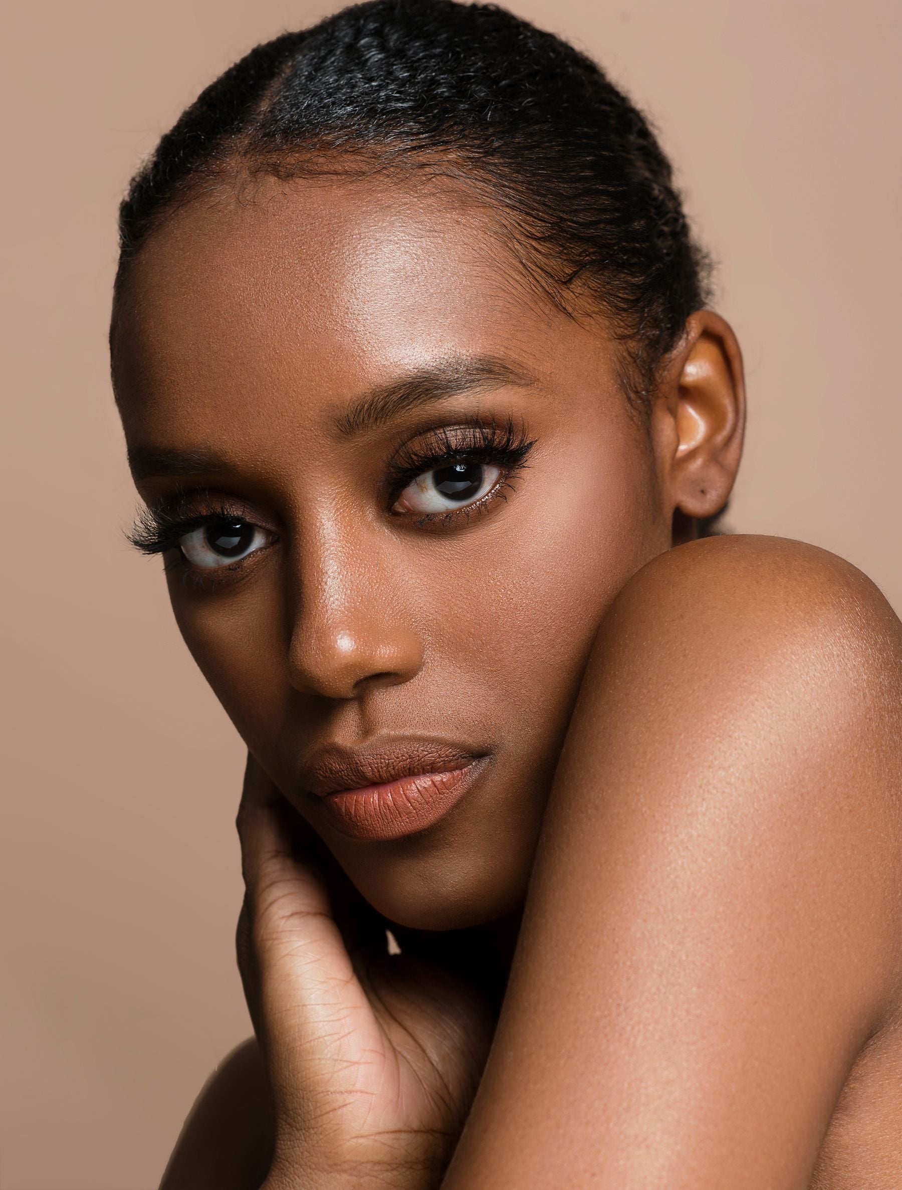 Woman with glowing hydrated skin using HydraLuxa